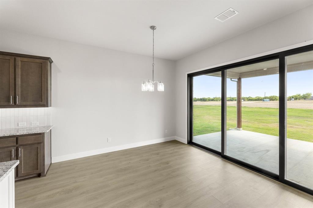 132 Evanston Court Rhome, TX 76078 - Photo 18 of 40 132 Evanston-Breakfast Nook-1