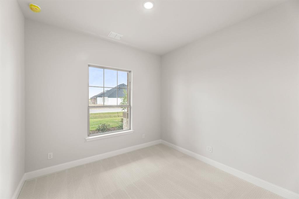 132 Evanston Court Rhome, TX 76078 - Photo 34 of 40 132 Evanston-Bedroom-1