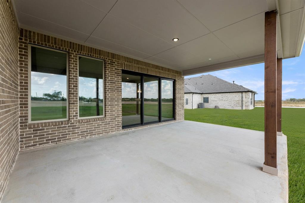 132 Evanston Court Rhome, TX 76078 - Photo 38 of 40 132 Evanston-Patio-1