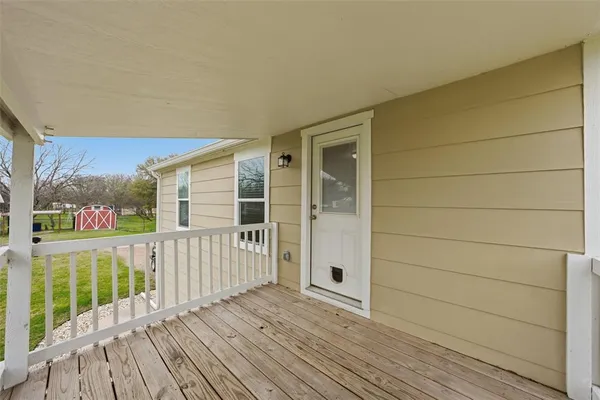 a view of a house with a porch