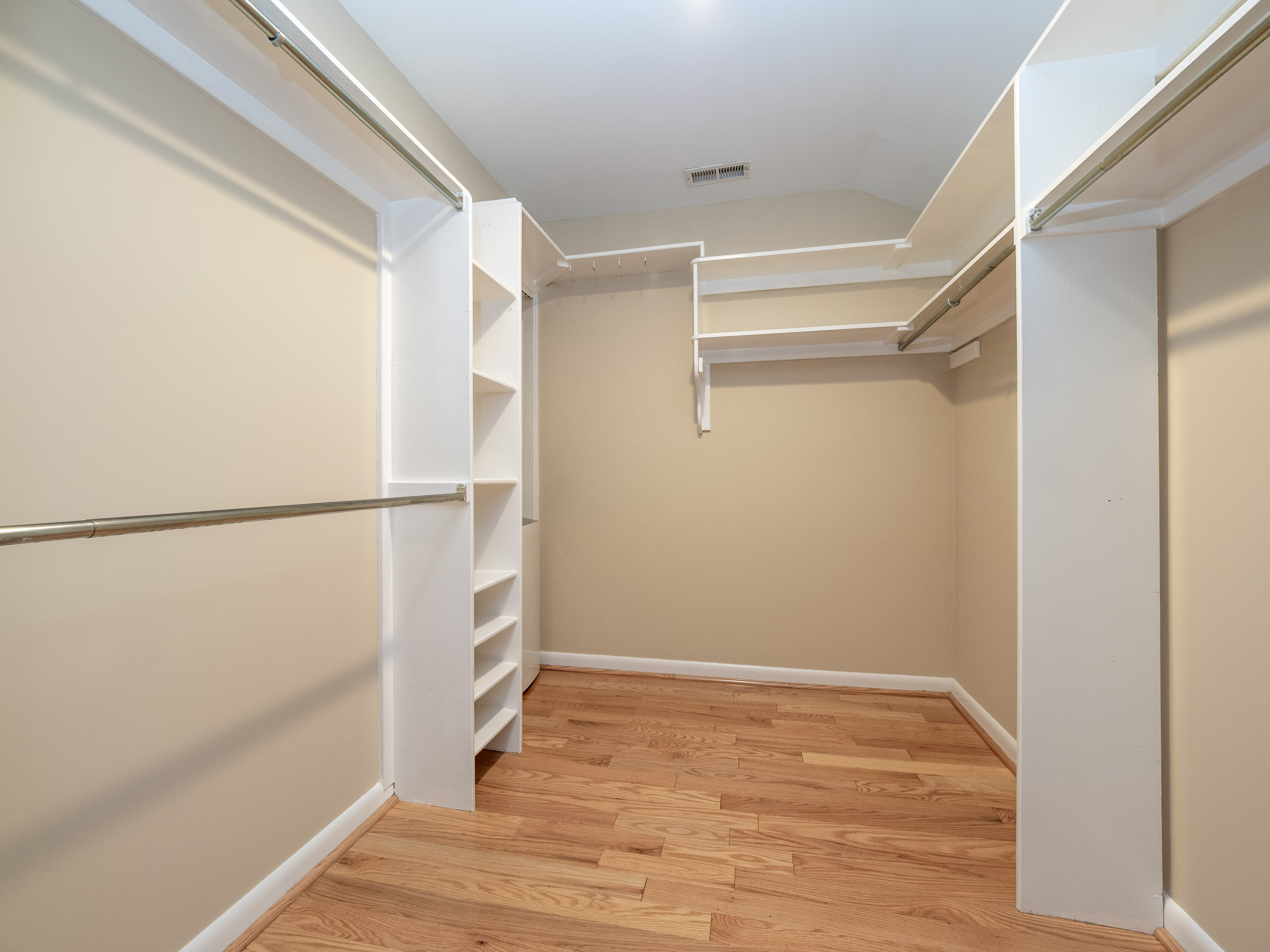 52 Glen Ridge, Unit 52 Wilton, CT 06897 - Photo 18 of 27 a view of an empty walk in closet