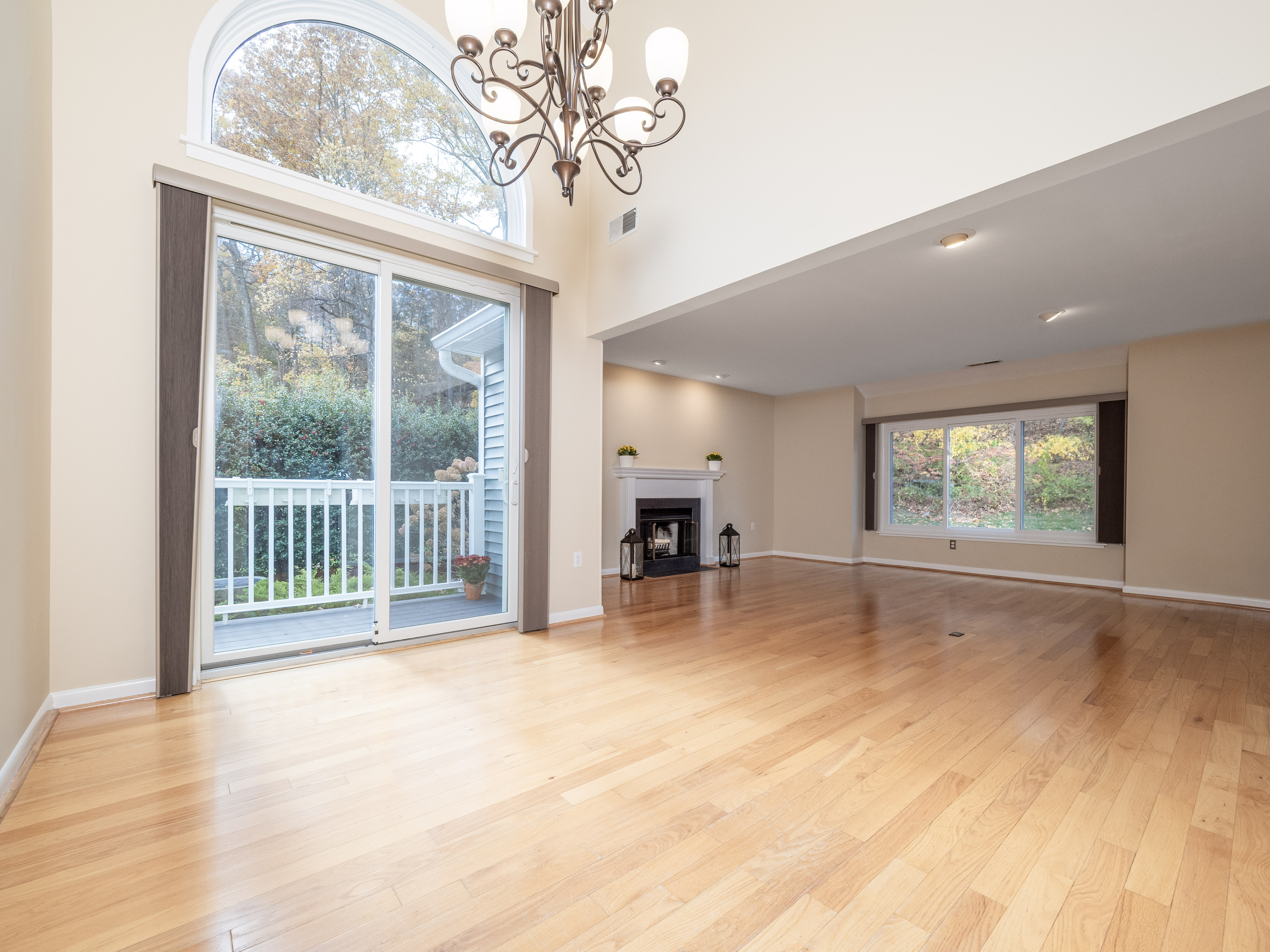 52 Glen Ridge, Unit 52 Wilton, CT 06897 - Photo 26 of 27 a view of a room with a large window and chandelier