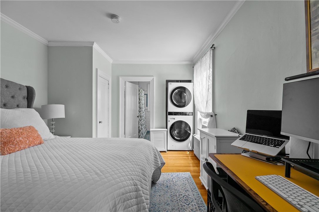 36 Kay Street, Unit 5 Newport, RI 02840 - Photo 17 of 26 Guest Bedroom with View to Guest En-Suite Bath and Laundry