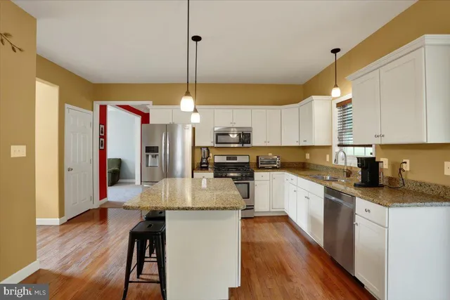 a dining room with furniture window wooden floor
