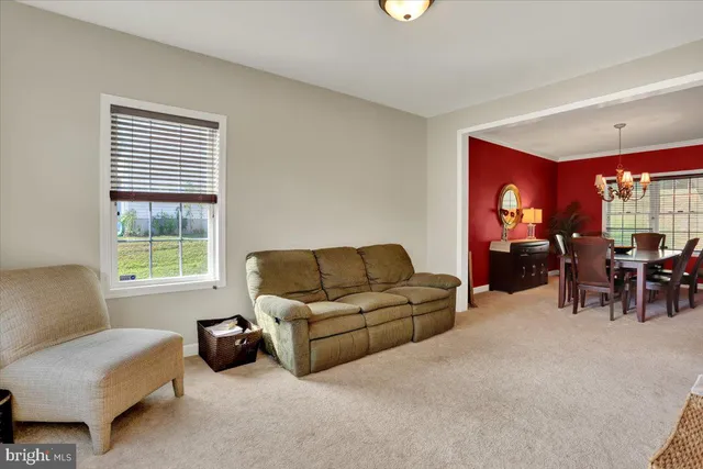 a room with furniture and a window