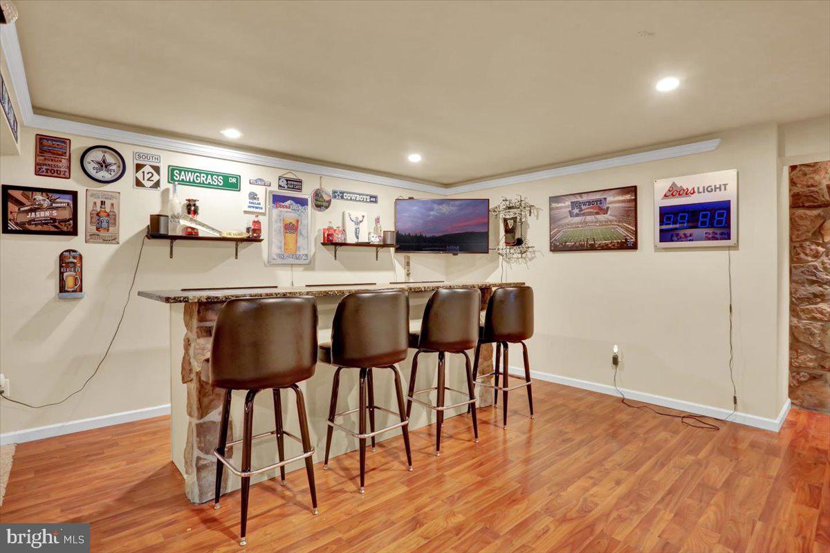 21 Sawgrass Drive Reading, PA 19606 - Photo 24 of 51 a view of a dining room with furniture and wooden floor