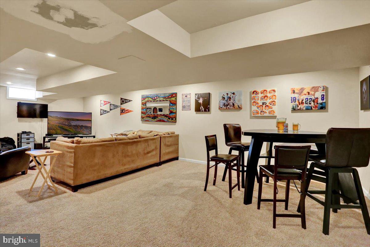 21 Sawgrass Drive Reading, PA 19606 - Photo 25 of 51 a living room with furniture and a flat screen tv