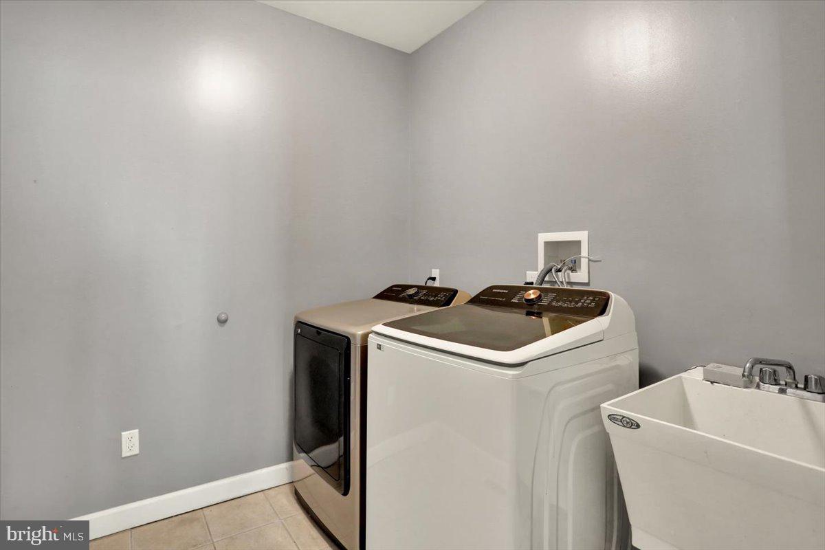 21 Sawgrass Drive Reading, PA 19606 - Photo 29 of 51 a utility room with dryer and washer