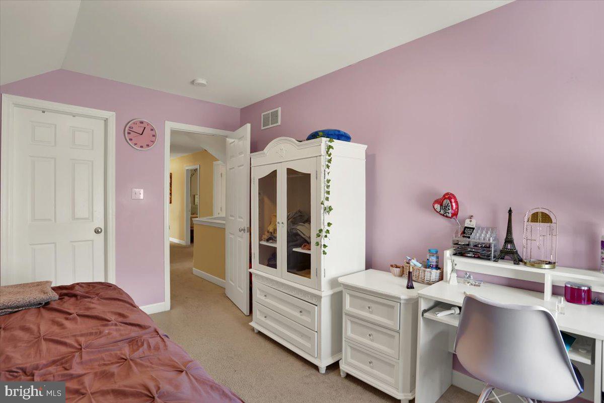 21 Sawgrass Drive Reading, PA 19606 - Photo 31 of 51 a bedroom with a bed and a dresser
