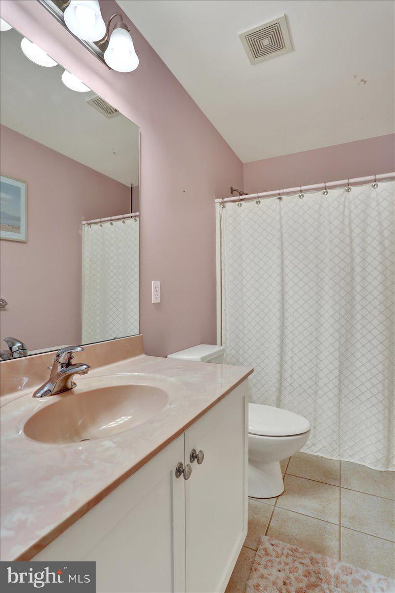 21 Sawgrass Drive Reading, PA 19606 - Photo 33 of 51 a bathroom with a sink a toilet a mirror and shower