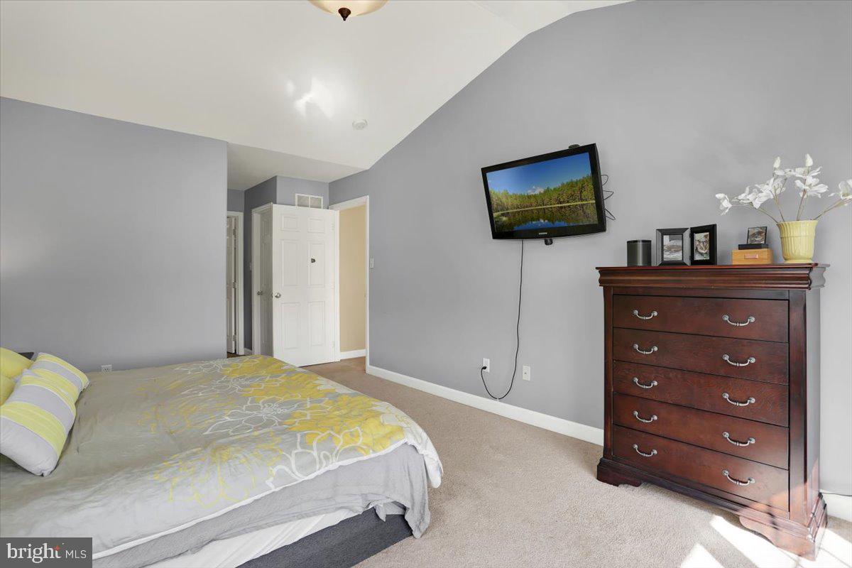 21 Sawgrass Drive Reading, PA 19606 - Photo 41 of 51 a bedroom with a bed and a television