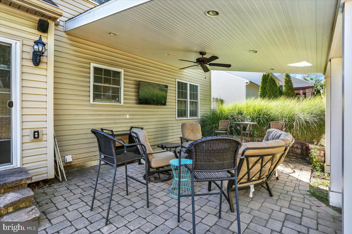 21 Sawgrass Drive Reading, PA 19606 - Photo 46 of 51 a patio with table and chairs