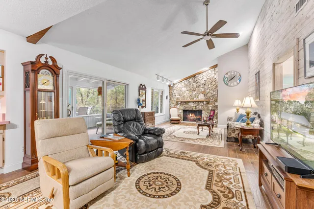 a view of a patio with a table and chairs