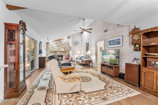 a patio with table and chairs