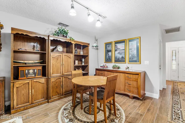 a view of a yard with trees