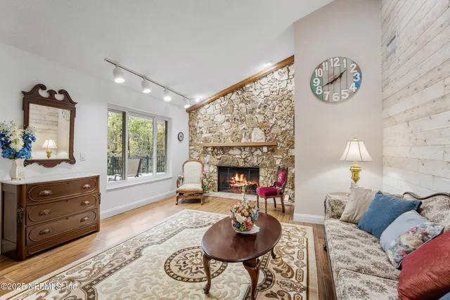 a kitchen with stainless steel appliances a sink and a refrigerator