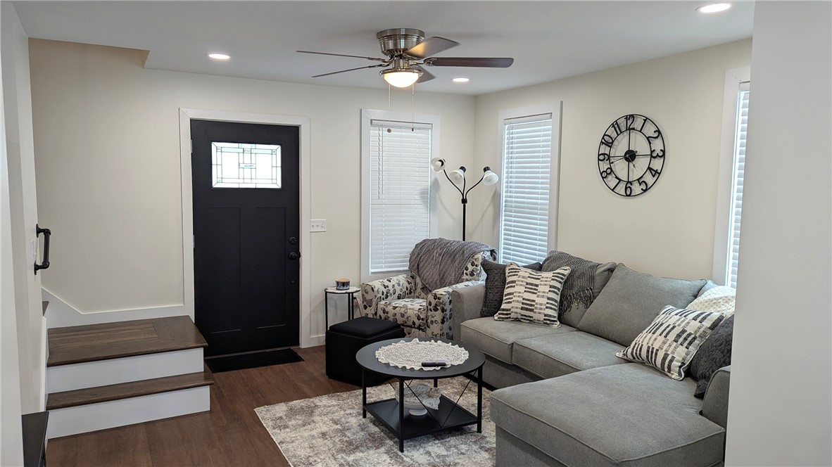 79 Liberty Street Walton, NY 13856 - Photo 14 of 37 Spacious living room with landing for staircase to