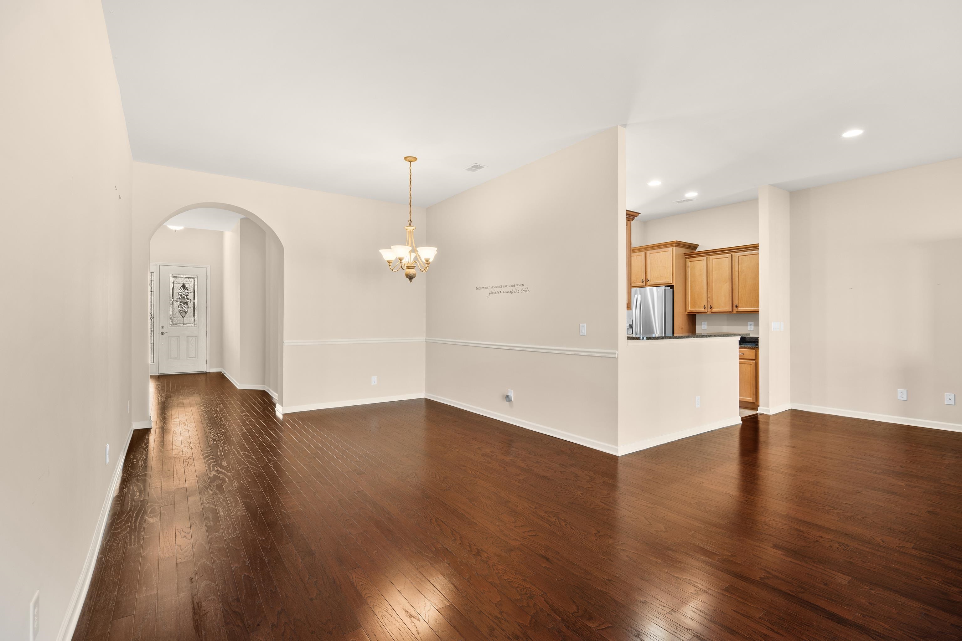 1006 Nittany Court Murrells Inlet, SC 29576 - Photo 13 of 39 Look down the hall into the Foyer and front door.
