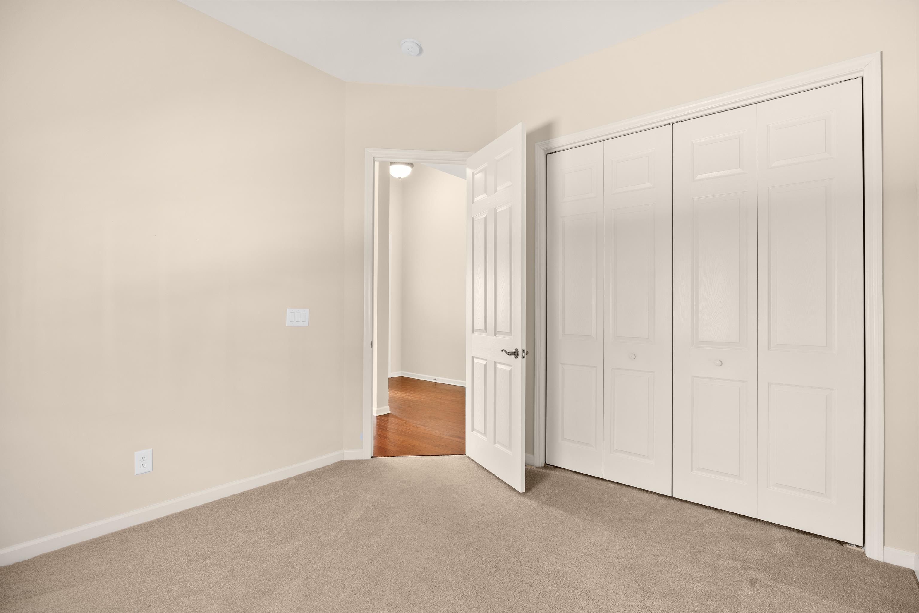 1006 Nittany Court Murrells Inlet, SC 29576 - Photo 9 of 39 This bedroom has carpet, and double bi-folded doors to the closet. The carpet is in great condition. Can also be used as a den.