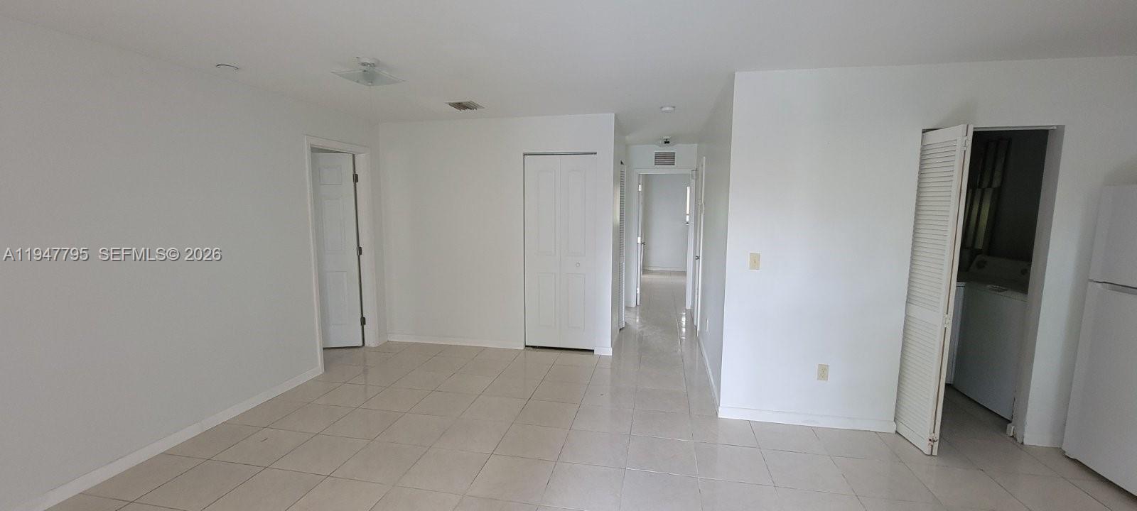 14242 Southwest 283rd Street Homestead, FL 33033 - Photo 7 of 7 a view of an empty room
