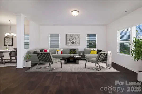 a living room with furniture and window