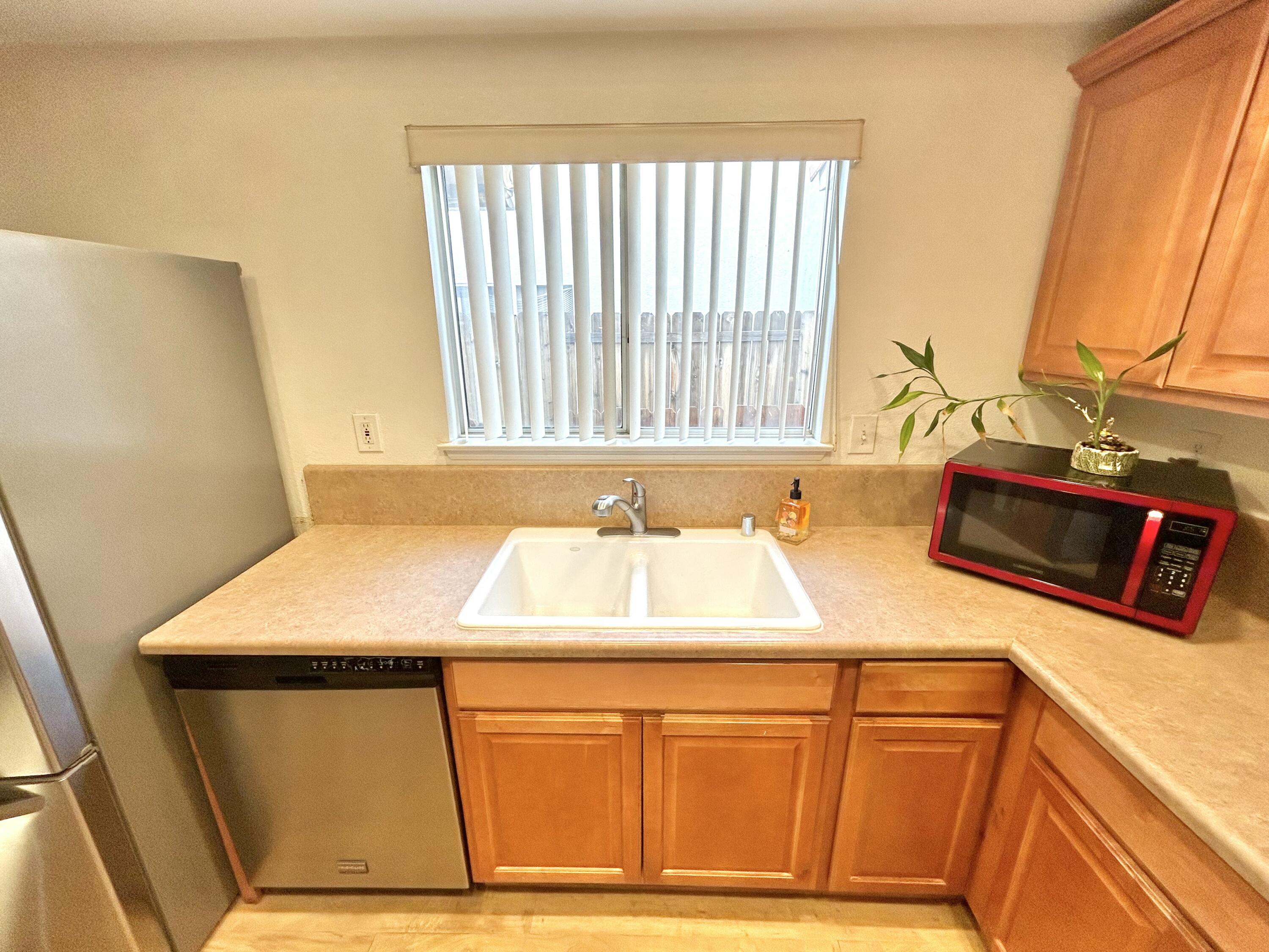 19940 Promenade Circle Riverside, CA 92508 - Photo 12 of 33 a bathroom with a sink and a window