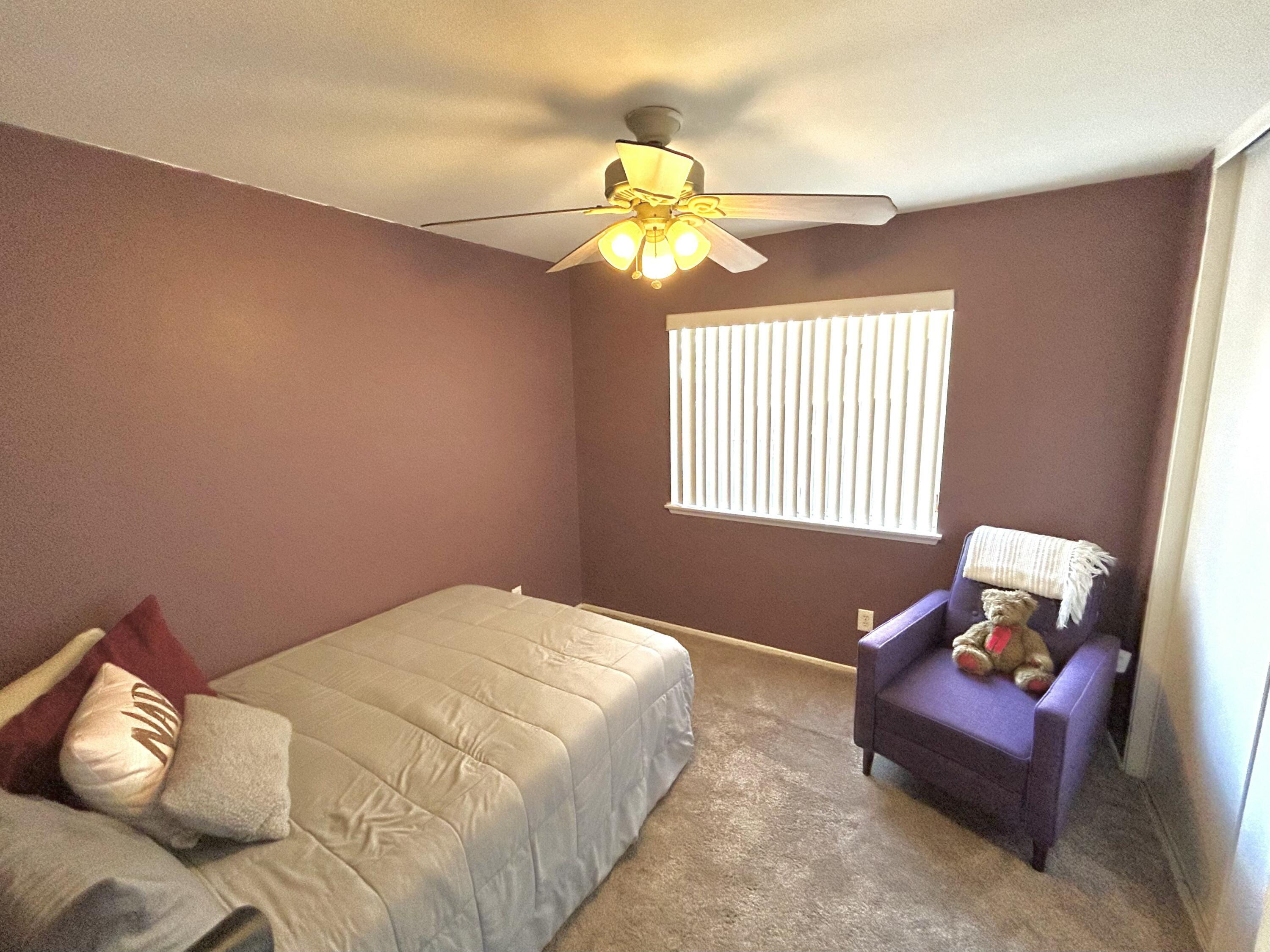 19940 Promenade Circle Riverside, CA 92508 - Photo 14 of 33 a bedroom with a bed and a window