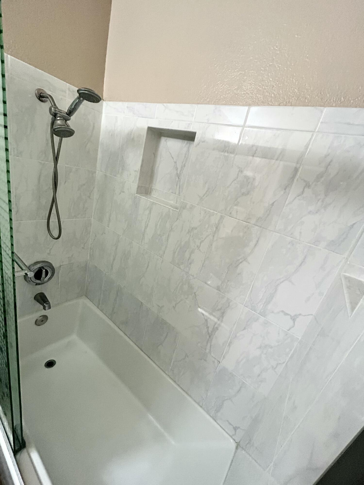 19940 Promenade Circle Riverside, CA 92508 - Photo 16 of 33 a bathroom with a shower