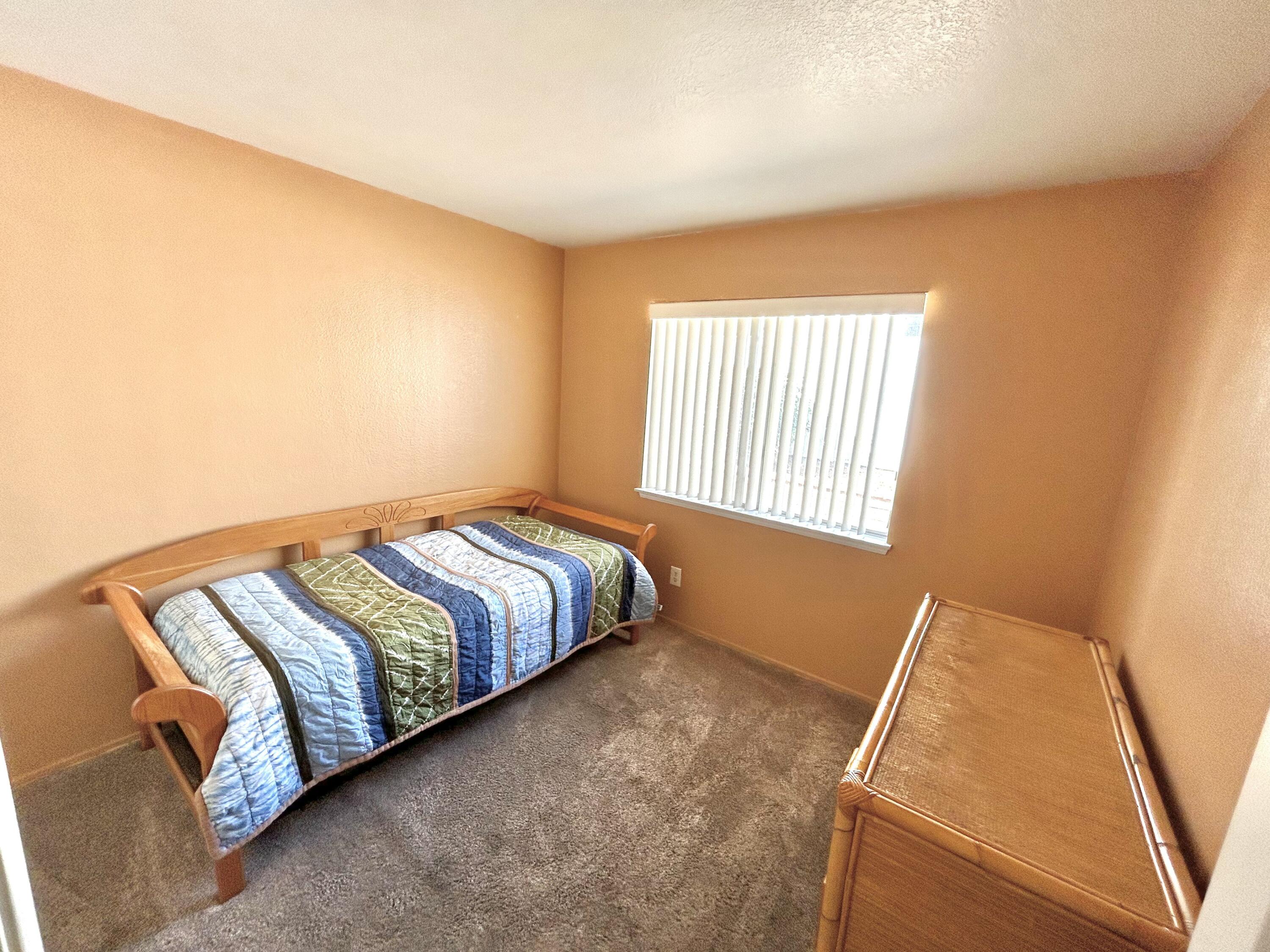 19940 Promenade Circle Riverside, CA 92508 - Photo 25 of 33 a bedroom with a bed and a window