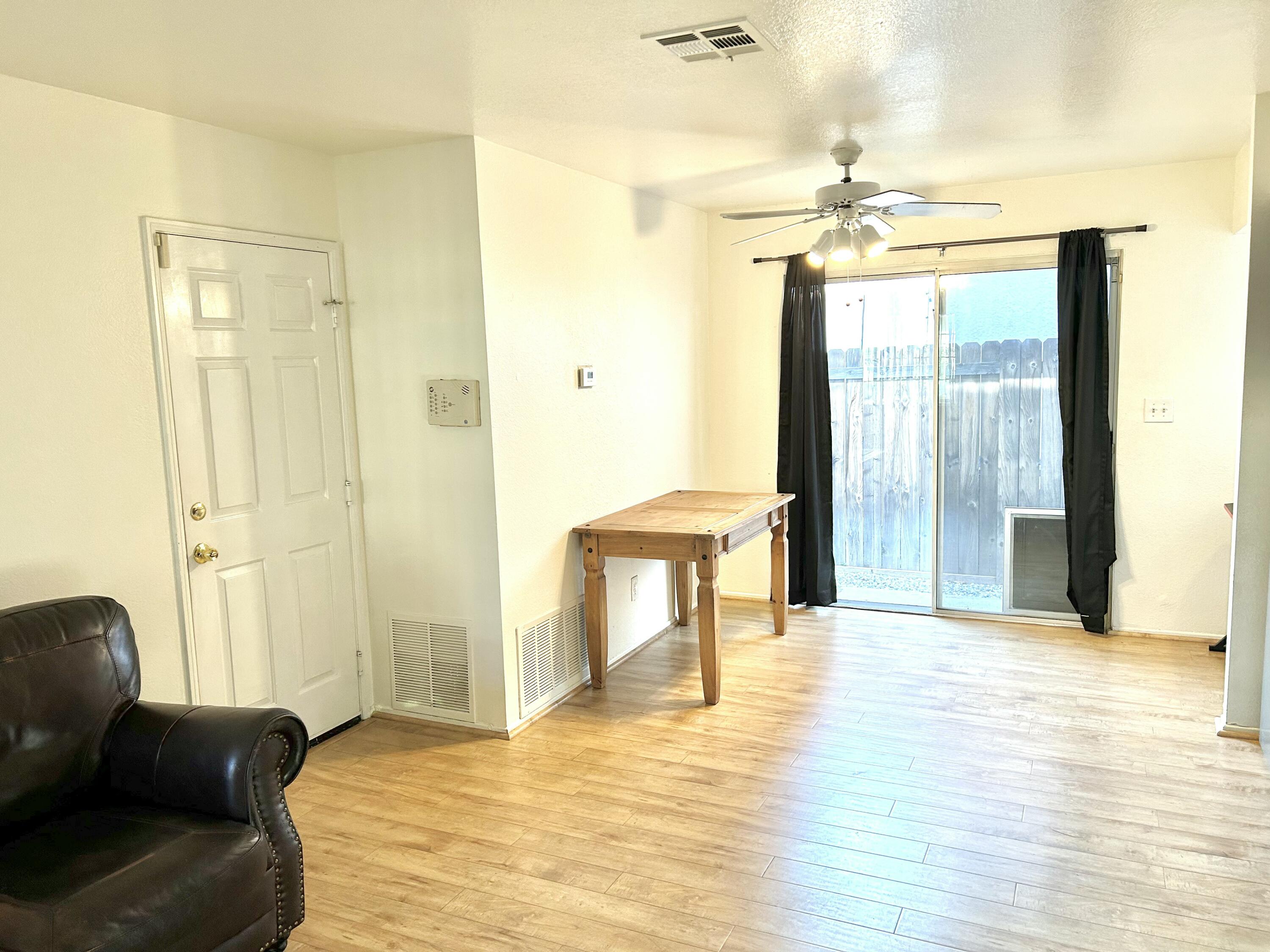 19940 Promenade Circle Riverside, CA 92508 - Photo 29 of 33 a living room with furniture and a chandelier
