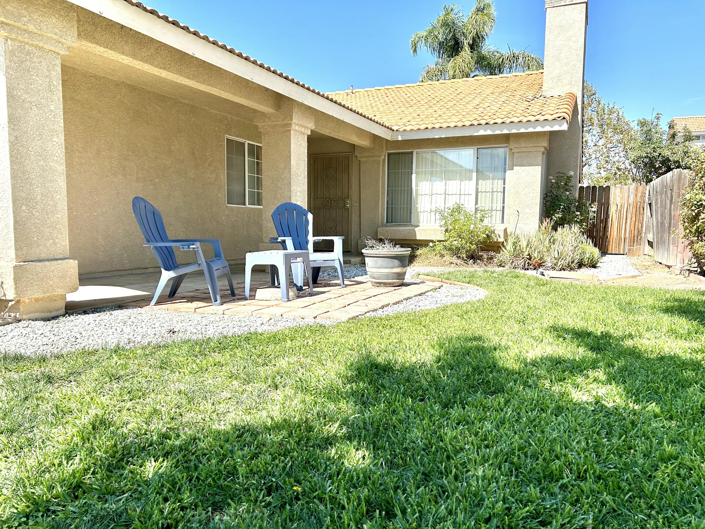 19940 Promenade Circle Riverside, CA 92508 - Photo 3 of 33 a view of a house with backyard and sitting area