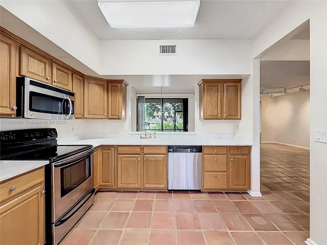 a view of livingroom with furniture wooden floor and window