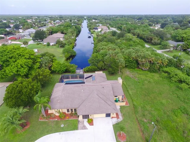 an aerial view of a house with a garden