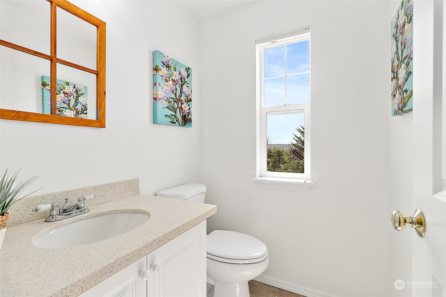 2300 Benson Road South, Unit E2 Renton, WA 98055 - Photo 19 of 35 a bathroom with a toilet sink and mirror