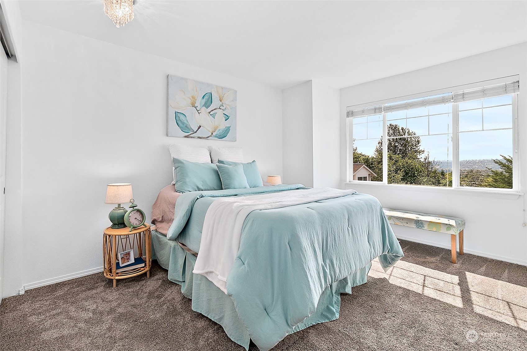 2300 Benson Road South, Unit E2 Renton, WA 98055 - Photo 25 of 35 a bedroom with a bed and a painting on the wall