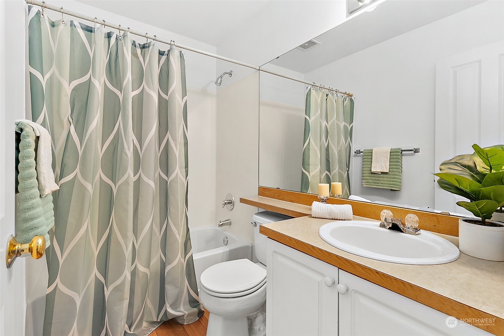 2300 Benson Road South, Unit E2 Renton, WA 98055 - Photo 29 of 35 a bathroom with a granite countertop sink and a mirror