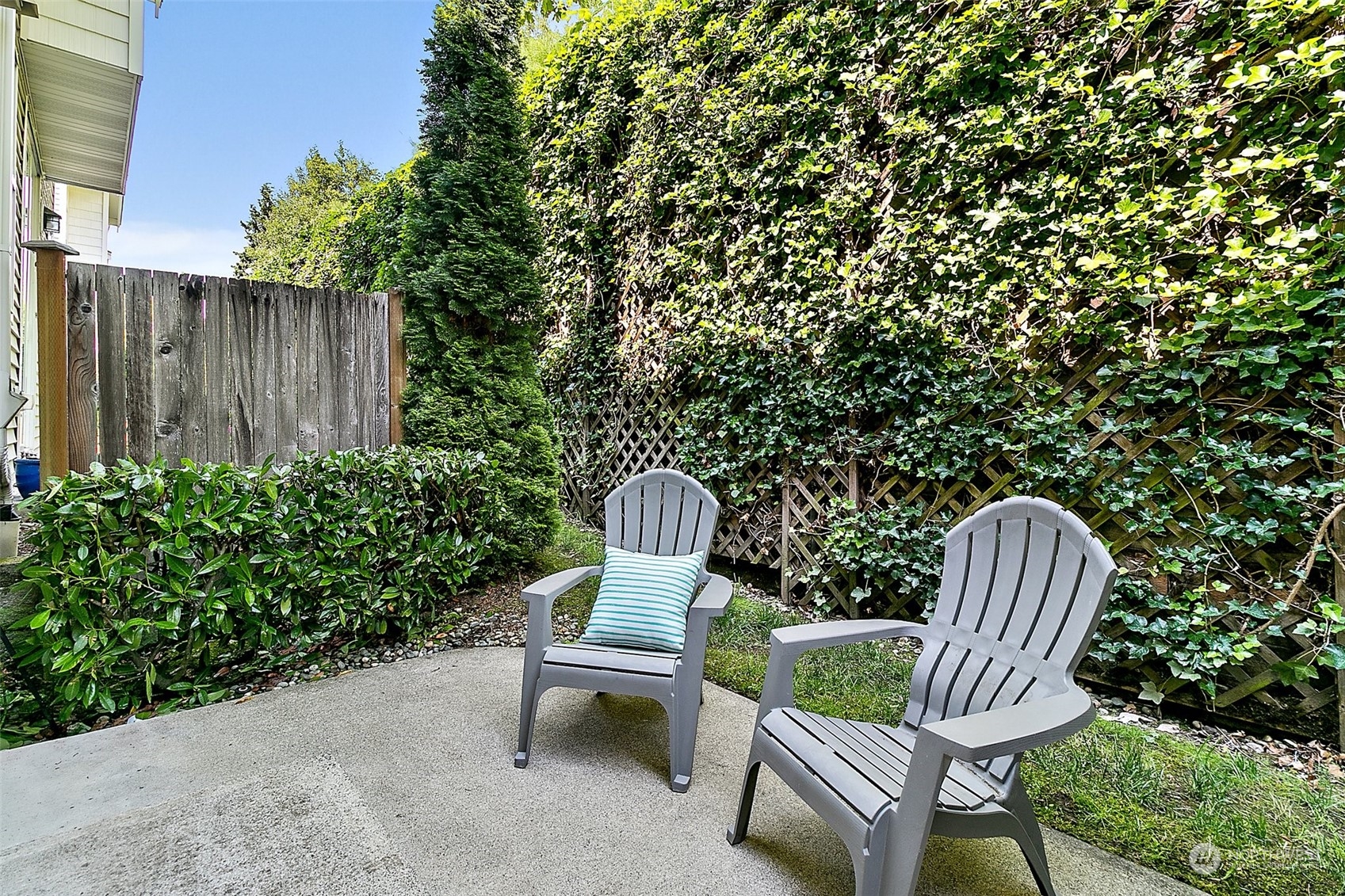 2300 Benson Road South, Unit E2 Renton, WA 98055 - Photo 31 of 35 a view of two chairs in the backyard