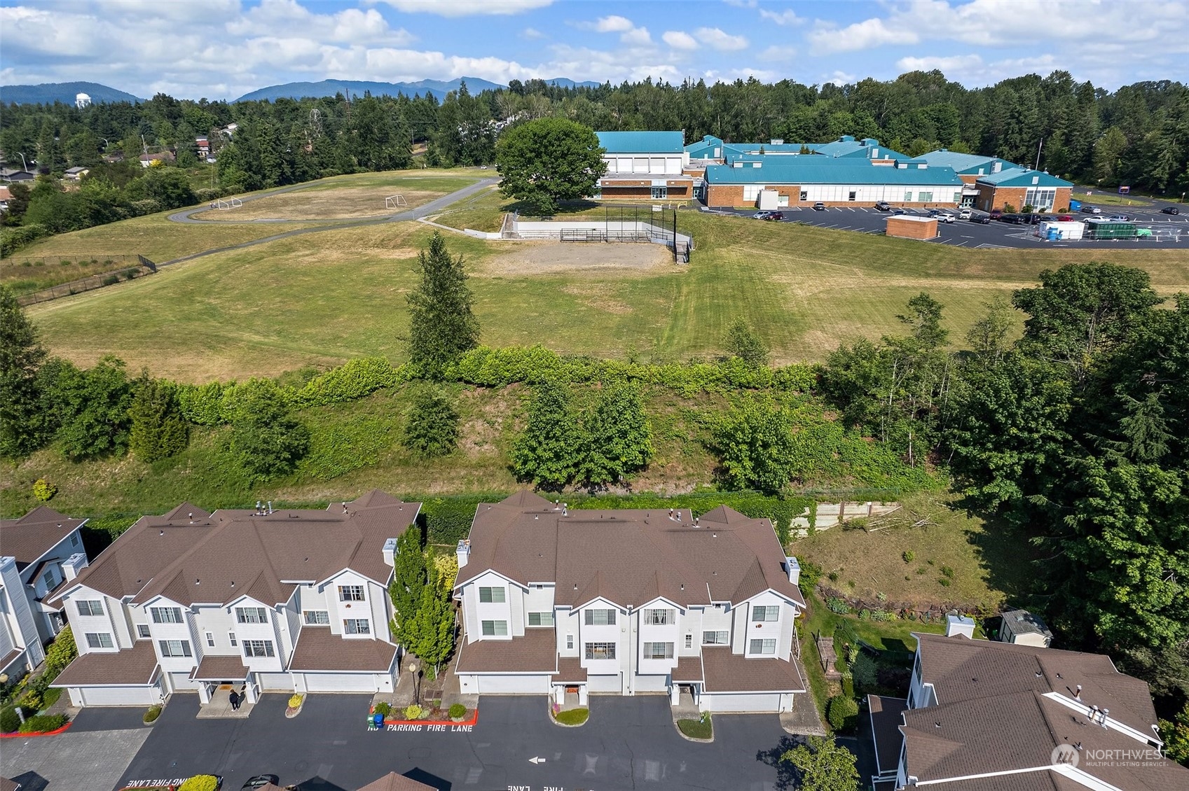 2300 Benson Road South, Unit E2 Renton, WA 98055 - Photo 33 of 35 an aerial view of residential houses with outdoor space