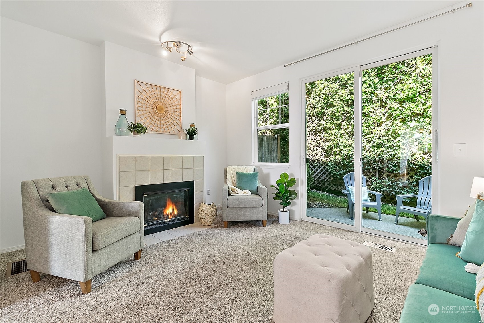2300 Benson Road South, Unit E2 Renton, WA 98055 - Photo 6 of 35 a living room with furniture and a fireplace