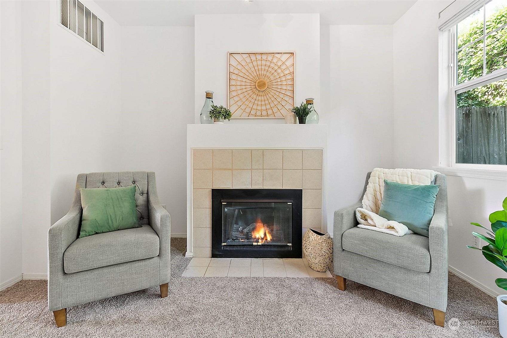2300 Benson Road South, Unit E2 Renton, WA 98055 - Photo 7 of 35 a living room with furniture and a fireplace