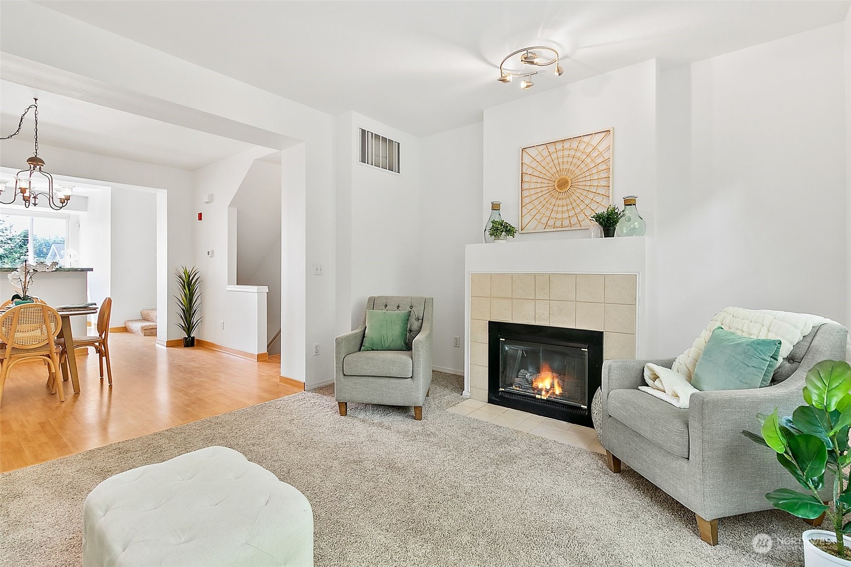 2300 Benson Road South, Unit E2 Renton, WA 98055 - Photo 8 of 35 a living room with furniture and a fireplace