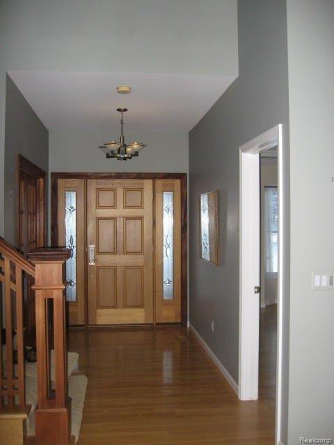 2294 South Hickory Ridge Road Milford, MI 48380 - Photo 4 of 20 FOYER LEADING TO STUDY, MASTER S