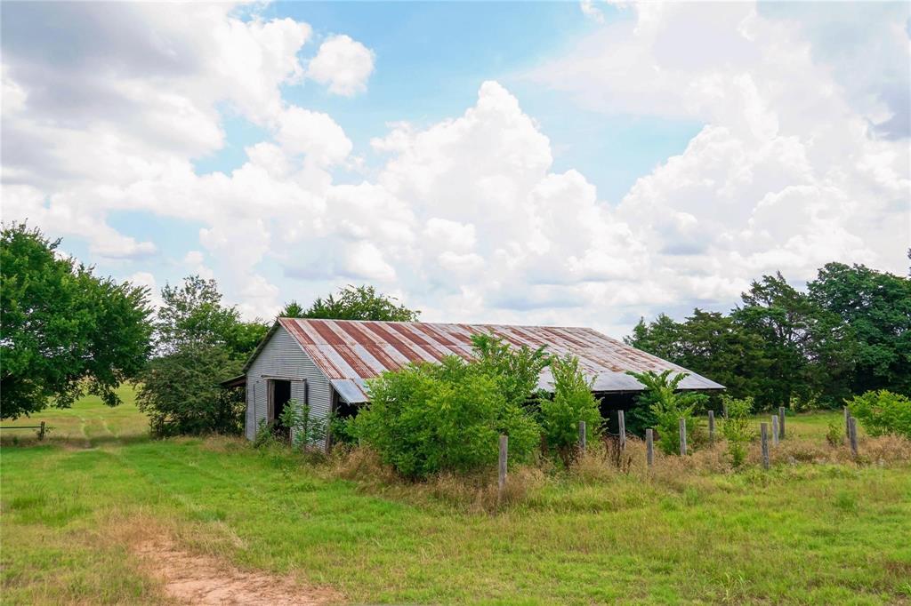 7527 Highway 1753 Denison, TX 75021 - Photo 2 of 10 a view of a garden