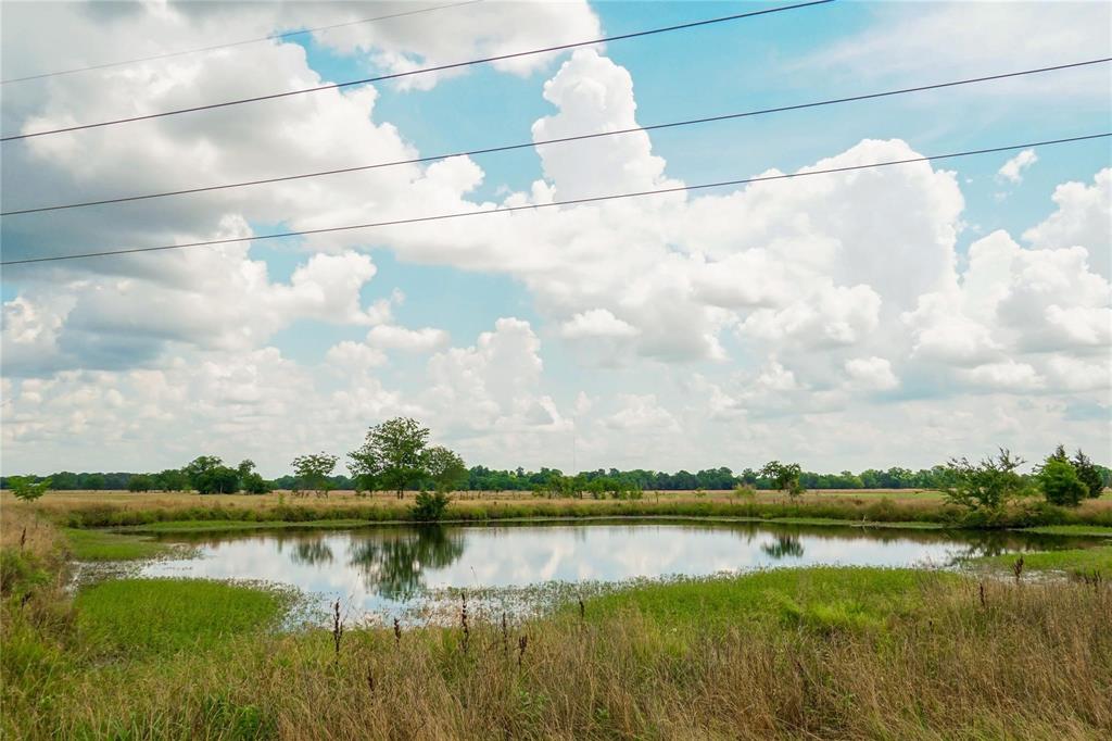 7527 Highway 1753 Denison, TX 75021 - Photo 5 of 10 a view of a lake from a city