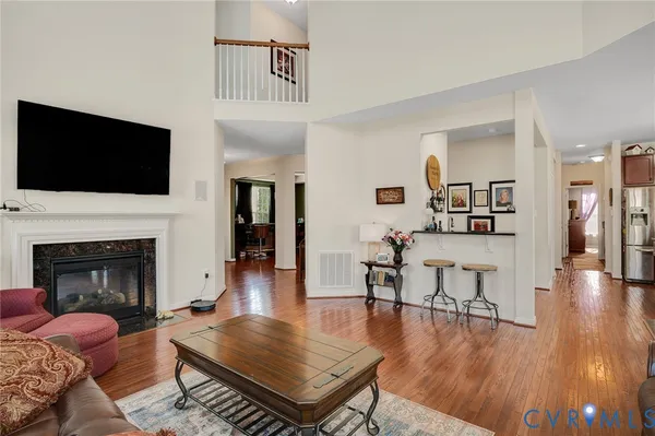 a kitchen with stainless steel appliances granite countertop a stove a sink dishwasher a refrigerator and a oven