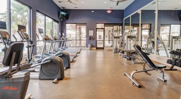 a view of a room with gym equipment