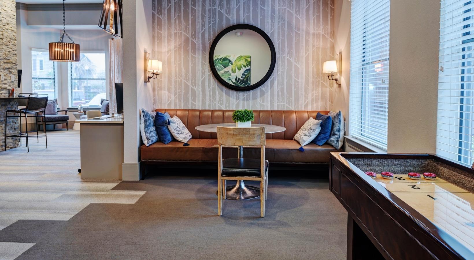 2539 Spring Cypress Road, Unit 8305 Spring, TX 77388 - Photo 9 of 13 a living room with furniture and a table