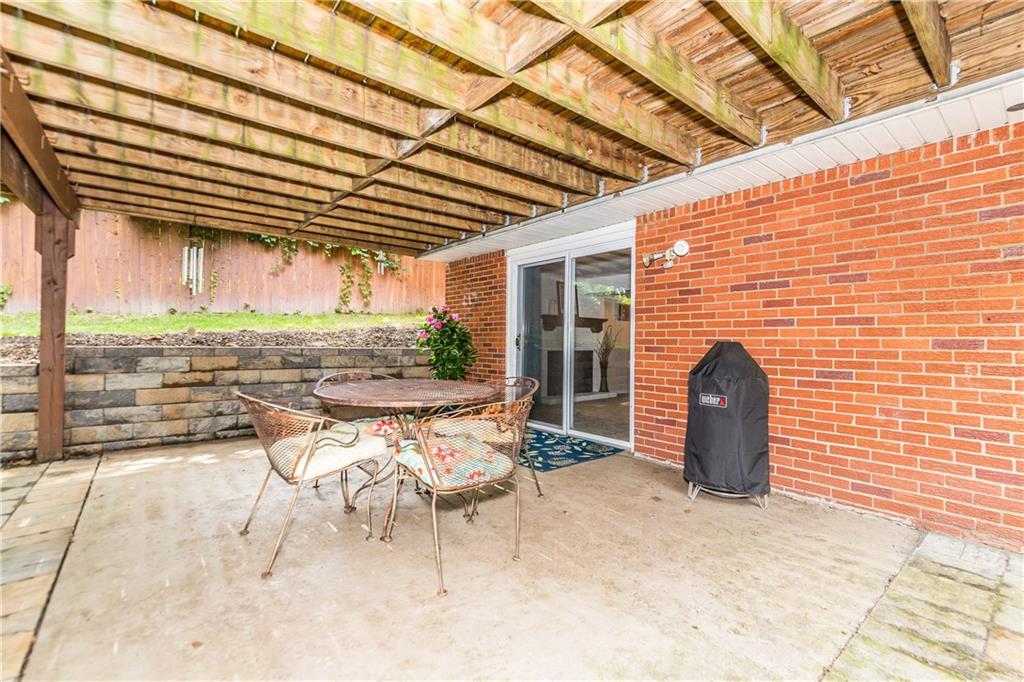205 Wyngate Road Coraopolis, PA 15108 - Photo 20 of 25 Outdoor patio is just off the family room in the lower level and makes a great entertaining area.