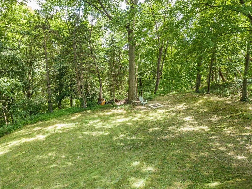 205 Wyngate Road Coraopolis, PA 15108 - Photo 25 of 25 Fire pit area for those chilled evenings. Or entertaining with marshmallows over a fire.