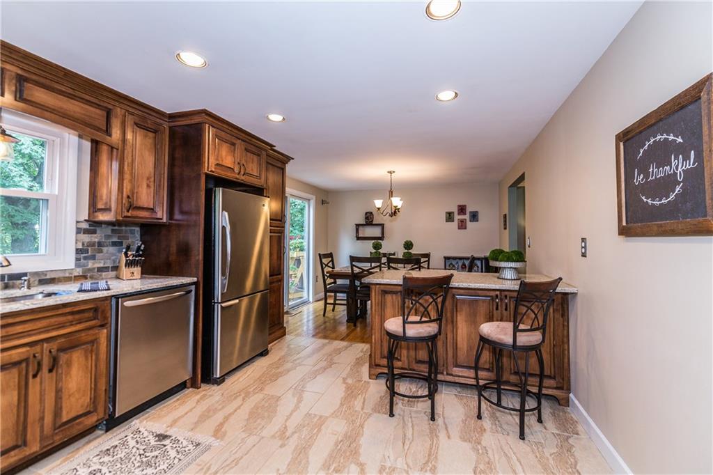 205 Wyngate Road Coraopolis, PA 15108 - Photo 4 of 25 Ceramic floor in the kitchen with hardwood floors in the dinette area for easy maintenance.